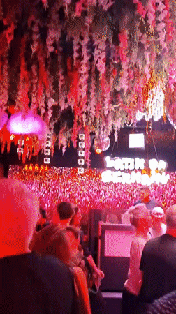 Busy Mainz nightclub, disco balls and neon on a Friday night