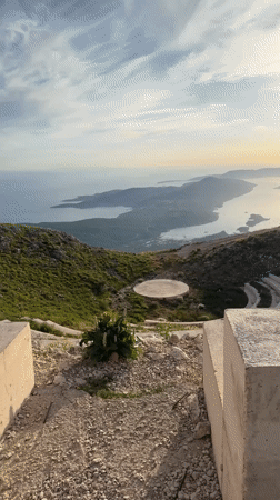 Sunset at Kuk's hilltop amphitheater overlooking a Montenegrin bay