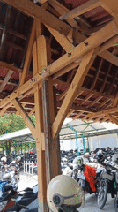 Inside and outside a busy health facility in Ambarketawang