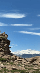 Mountainous region with traditional dress, ruins, village documented