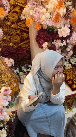 Community gathering with shared meal in Meunasah Raya
