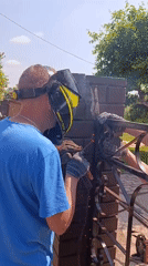Morning moments: welding, hammock rest, cat pets, garden blooms