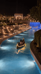 Gondolas and waterfalls light up a Sharm El Sheikh canal at night