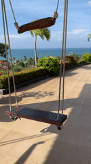 Traditional beachfront house with swing documented in Vietnam coastal area