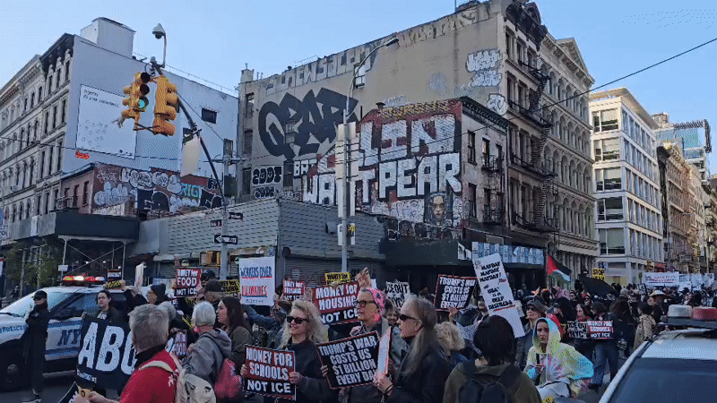 Political protesters march through NYC streets with police presence