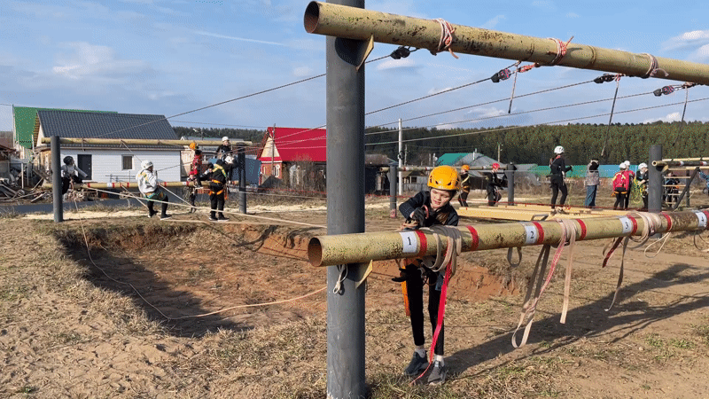 Youth navigates ropes course in Sarapul, Russia