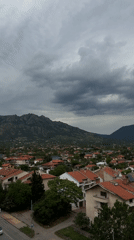 Aerial view captures Sliven, Bulgaria under cloudy skies