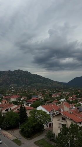 Aerial view captures Sliven, Bulgaria under cloudy skies