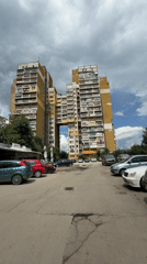 Sofia's iconic H-shaped brutalist block, seen from a car