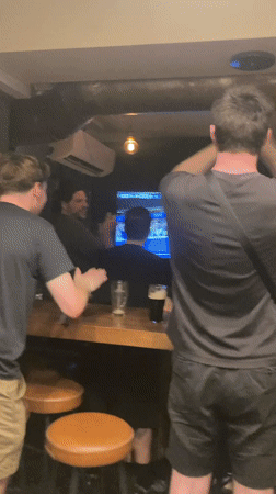 Boston Terrier night out in a Barcelona bar neighborhood