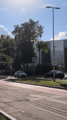 Ordinary traffic and cycling observed in sunny Moscow afternoon