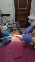 Woman documents dental clinic visit in Izhevsk