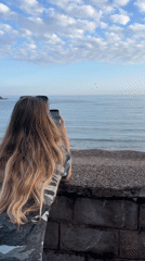 Tourists capture coastal scenes and local life in Boreti