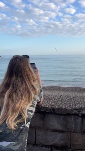 Tourists capture coastal scenes and local life in Boreti