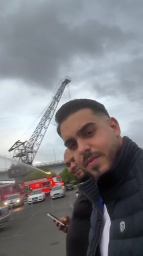 Emergency response with water crane deployed near Frankfurt waterfront