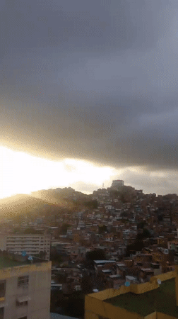 Caracas hillside neighborhoods at dusk, multiple angles