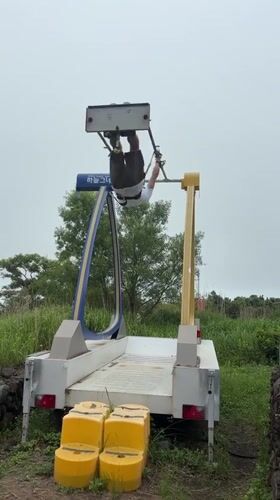 Portable harness swing ride in action, Jeju
