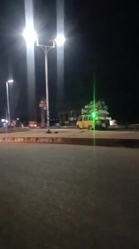 Yellow van spotted on traffic circle platform in Bukuru