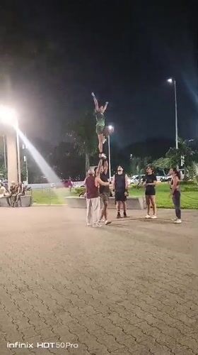 Caracas residents enjoy evening activities in illuminated public park