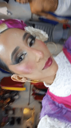 Venezuelan performers prepare backstage, take selfies before cultural performance