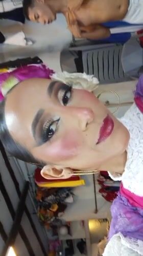 Venezuelan performers prepare backstage, take selfies before cultural performance