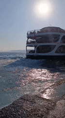 Istanbul ferries on the Bosphorus, docked and underway
