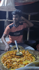 Food stall workers prepare meals in Bangladesh