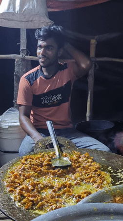 Food stall workers prepare meals in Bangladesh