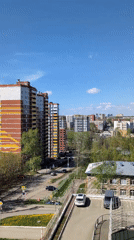 Morning cityscape captured in Izhevsk under blue skies