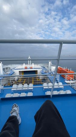 Ferry passenger records deck view near Keramoti, Greece