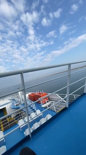 Ferry passenger records deck view near Keramoti, Greece