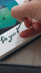 Artist paints UFO abduction scene in Russian sketchbook
