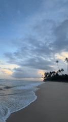 Sri Lankan beaches witness dramatic sunset through storm clouds
