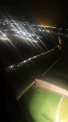Night flight over Ob, Russia captured from airplane window