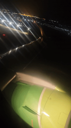 Night flight over Ob, Russia captured from airplane window