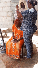 Daily life unfolds in Nigerian village community gathering