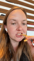 Person enjoys McDonald's meal in northern Italian town