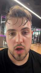 Man recorded at Moscow fitness center shows animated expression