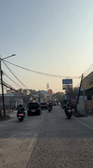 Street scenes and food carts along Tangerang's urban fringe
