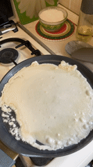 Pancake cooking documented in Rusanovo kitchen