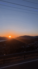 Sun captured over coastal mountains in Kaş, Turkey