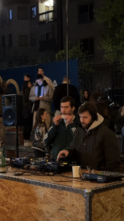 Outdoor DJ party and basketball court activity in Novi Sad