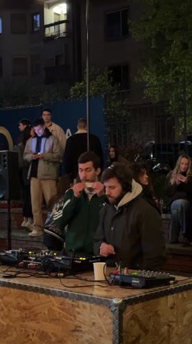 Outdoor DJ party and basketball court activity in Novi Sad