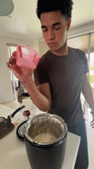 Kitchen activities and personal grooming captured in Mexican home