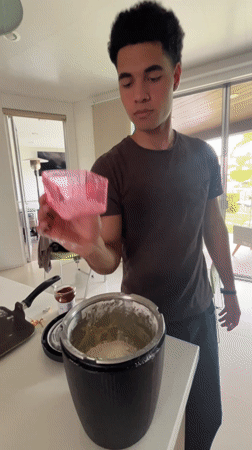 Kitchen activities and personal grooming captured in Mexican home