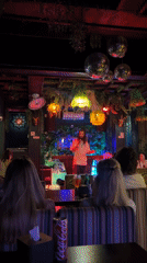 Speaker addresses patrons at Jumanji restaurant during lunch service