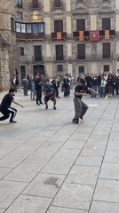 Breakdancers perform in Barcelona's Gothic Quarter Friday afternoon