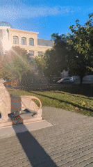 Morning activity at a Mykolaiv park, church, and playground