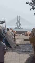 Person in grey hoodie spotted near Mumbai coastal bridge