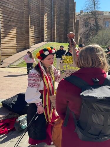 Pro-Ukraine demonstration with traditional music at Kyiv Golden Gate